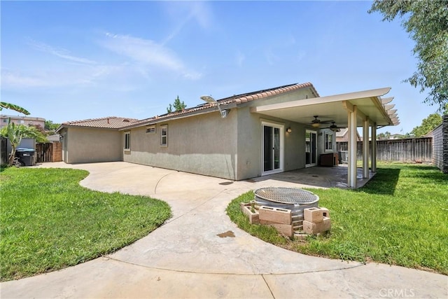 23885 Cheyenne Canyon Dr, Menifee, CA 92587 - rear view of property with a ceiling fan, a patio, and stucco siding