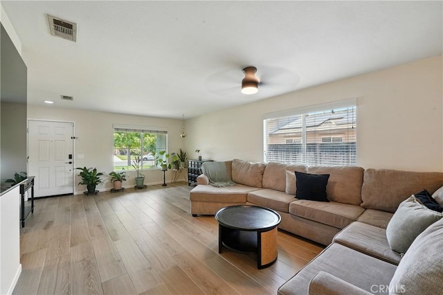 23885 Cheyenne Canyon Dr, Menifee, CA 92587 - living room with light wood-type flooring, a ceiling fan, and recessed lighting