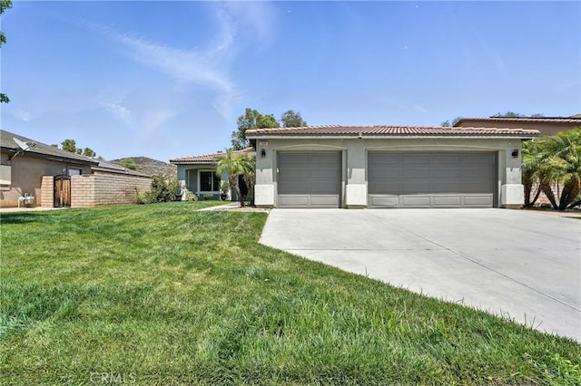 23885 Cheyenne Canyon Dr, Menifee, CA 92587 - view of front of home with concrete driveway, stucco siding, a front lawn, a tile roof, and a garage