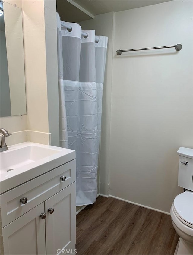 1326 Mulberry St, Chico, CA 95928 - full bath featuring wood finished floors, vanity, and a shower with curtain