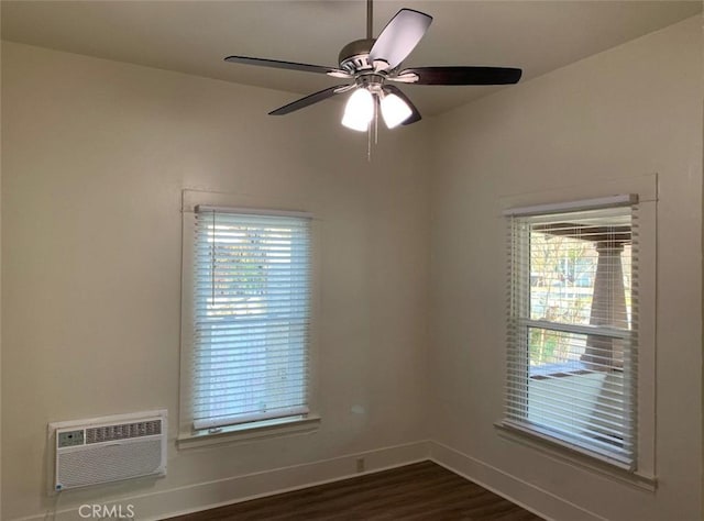 1326 Mulberry St, Chico, CA 95928 - unfurnished room featuring dark wood-style floors, a wall mounted air conditioner, and a ceiling fan
