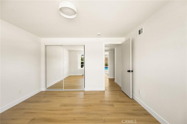 121 W Borromeo Ave, Placentia, CA 92870 - unfurnished bedroom featuring light wood-type flooring and a closet