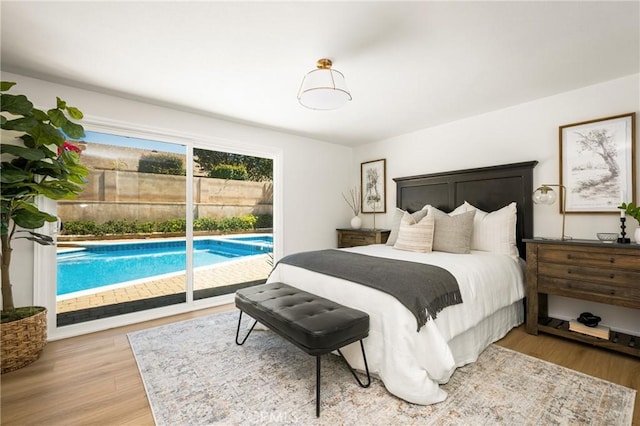 121 W Borromeo Ave, Placentia, CA 92870 - bedroom with access to exterior and wood finished floors