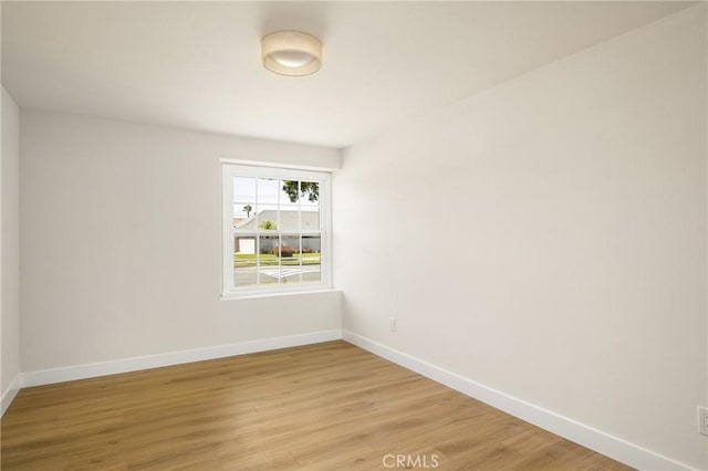 121 W Borromeo Ave, Placentia, CA 92870 - empty room featuring baseboards and light wood finished floors