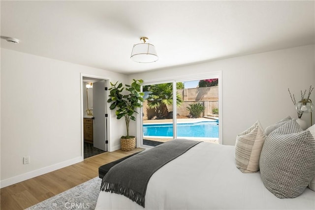 121 W Borromeo Ave, Placentia, CA 92870 - bedroom featuring access to exterior, wood finished floors, and ensuite bath
