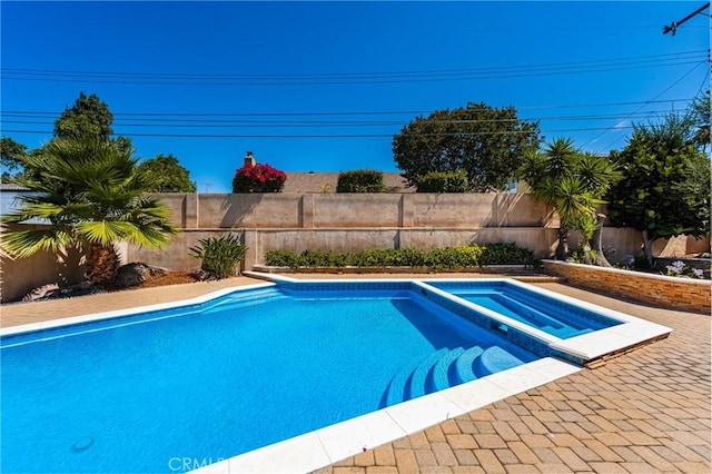 121 W Borromeo Ave, Placentia, CA 92870 - view of pool with an in-ground hot tub and a fenced backyard