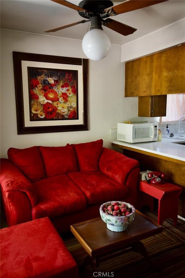 937 E 6th St, Madera, CA 93638 - living room featuring a ceiling fan