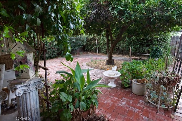 937 E 6th St, Madera, CA 93638 - fenced backyard with a patio