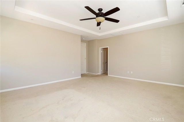 28245 Nield Ct, Saugus, CA 91350 - empty room with a tray ceiling, ceiling fan, and light colored carpet