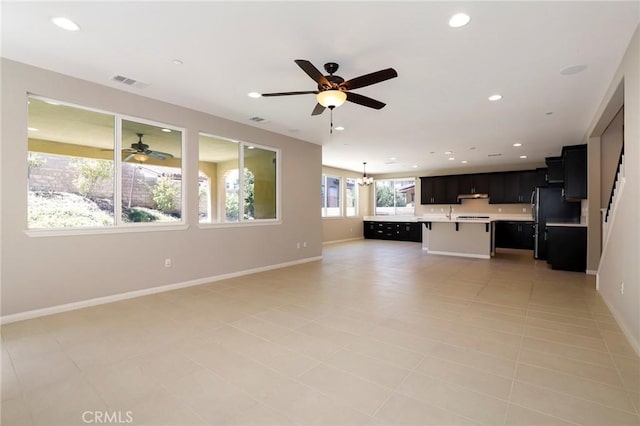 28245 Nield Ct, Saugus, CA 91350 - unfurnished living room with ceiling fan, recessed lighting, and light tile patterned floors