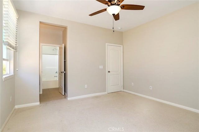 28245 Nield Ct, Saugus, CA 91350 - unfurnished bedroom featuring light carpet, ensuite bath, and a ceiling fan