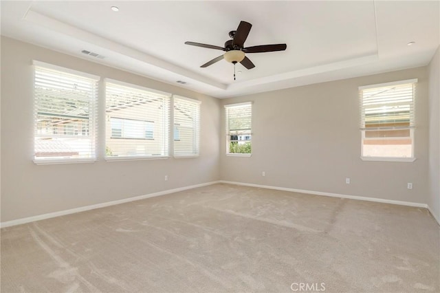 28245 Nield Ct, Saugus, CA 91350 - unfurnished room featuring a tray ceiling, ceiling fan, and light colored carpet