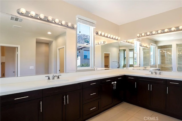 28245 Nield Ct, Saugus, CA 91350 - bathroom with double vanity, a shower stall, and tile patterned floors