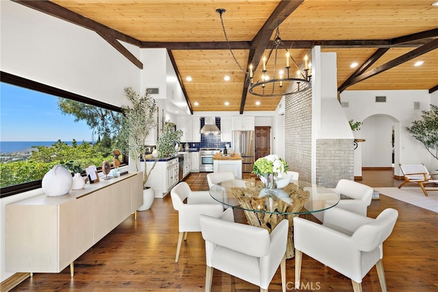 2575 Temple Hills Dr, Laguna Beach, CA 92651 - dining area featuring a wood ceiling with exposed beams, arched walkways, a chandelier, recessed lighting, and high vaulted ceiling