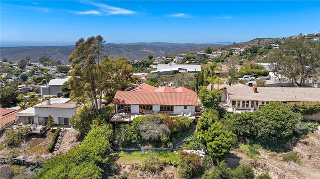 2575 Temple Hills Dr, Laguna Beach, CA 92651 - aerial overview of property's location with nearby suburban area and a mountainous background