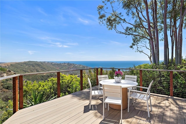 2575 Temple Hills Dr, Laguna Beach, CA 92651 - wooden terrace featuring outdoor dining area and a water view