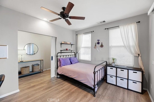 7346 Garnet Ridge Rd, Jurupa Valley, CA 92509 - bedroom with wood finished floors and a ceiling fan