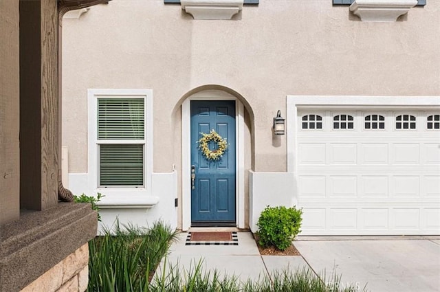 7346 Garnet Ridge Rd, Jurupa Valley, CA 92509 - doorway to property featuring stucco siding