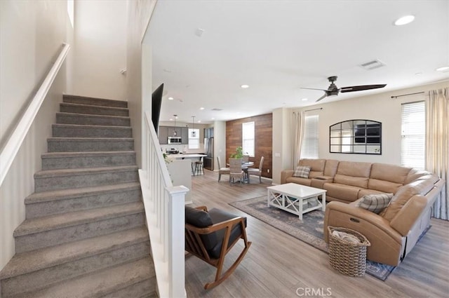 7346 Garnet Ridge Rd, Jurupa Valley, CA 92509 - living area with light wood-style flooring, a ceiling fan, recessed lighting, and stairs