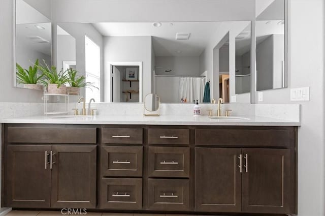 7346 Garnet Ridge Rd, Jurupa Valley, CA 92509 - bathroom featuring double vanity and a shower