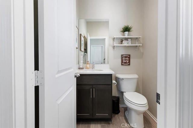 7346 Garnet Ridge Rd, Jurupa Valley, CA 92509 - half bath with vanity and wood finished floors