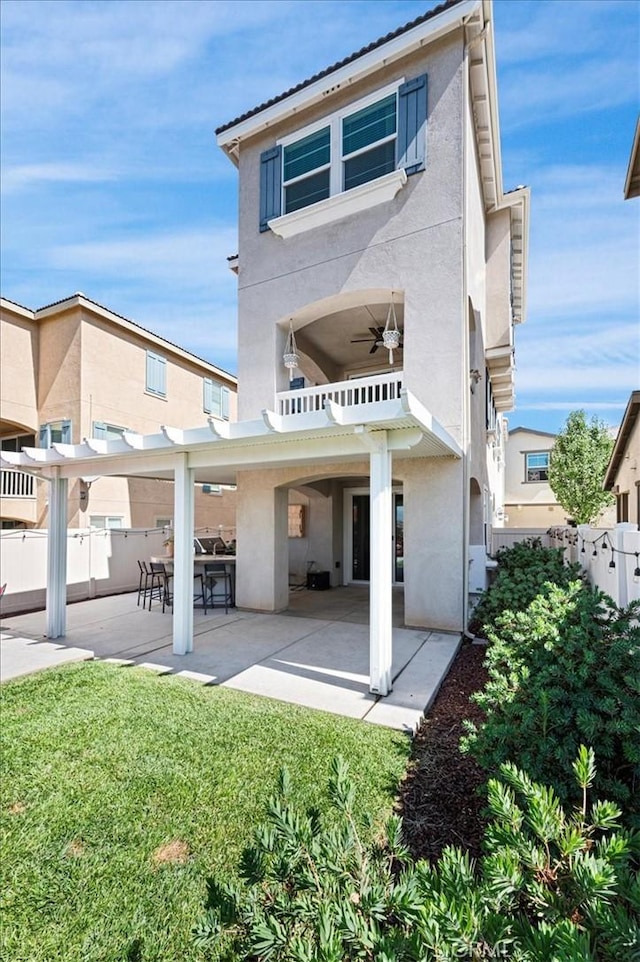 7346 Garnet Ridge Rd, Jurupa Valley, CA 92509 - rear view of property featuring stucco siding and a patio