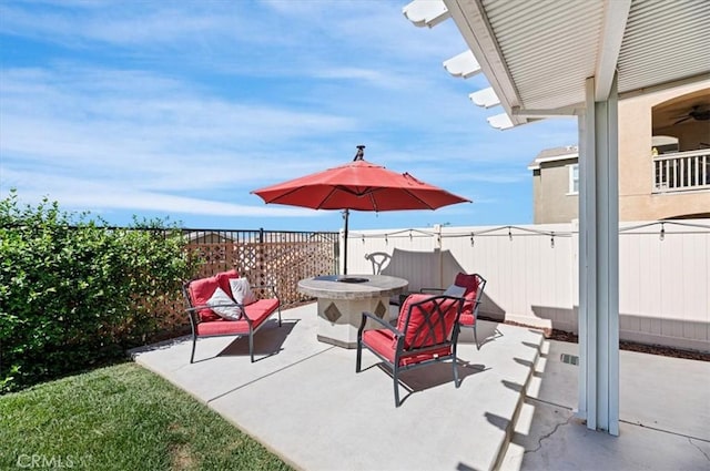 7346 Garnet Ridge Rd, Jurupa Valley, CA 92509 - view of patio featuring a fire pit