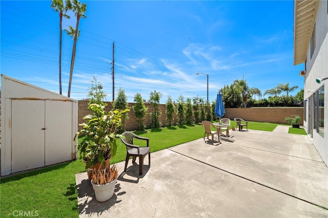 20822 Skimmer Ln, Huntington Beach, CA 92646 - fenced backyard featuring a storage shed and a patio