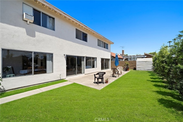 20822 Skimmer Ln, Huntington Beach, CA 92646 - back of property featuring stucco siding and a patio