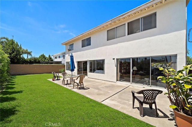 20822 Skimmer Ln, Huntington Beach, CA 92646 - back of house with a patio and stucco siding