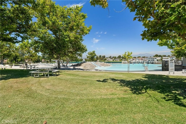 53 Misty Run Unit 10, Irvine, CA 92614 - view of grassy yard with an outdoor pool