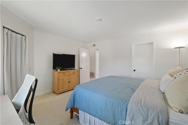 53 Misty Run Unit 10, Irvine, CA 92614 - bedroom featuring light carpet, a textured ceiling, and crown molding