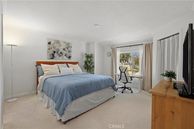53 Misty Run Unit 10, Irvine, CA 92614 - bedroom with light colored carpet, crown molding, and a textured ceiling