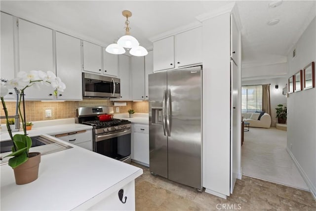 53 Misty Run Unit 10, Irvine, CA 92614 - kitchen featuring appliances with stainless steel finishes, light countertops, decorative backsplash, and white cabinets