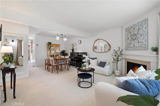 53 Misty Run Unit 10, Irvine, CA 92614 - living area featuring light colored carpet and a lit fireplace