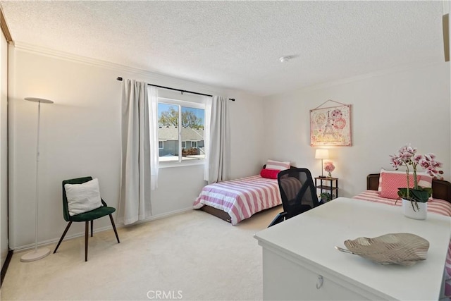 53 Misty Run Unit 10, Irvine, CA 92614 - bedroom featuring light colored carpet, a textured ceiling, and crown molding