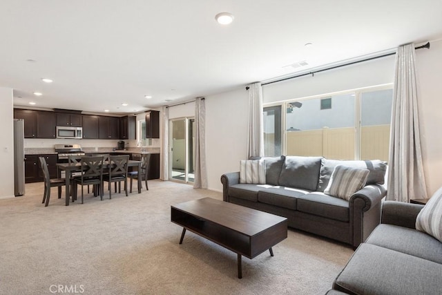 32985 Middlegate Pl, Lake Elsinore, CA 92530 - living area with recessed lighting and light colored carpet