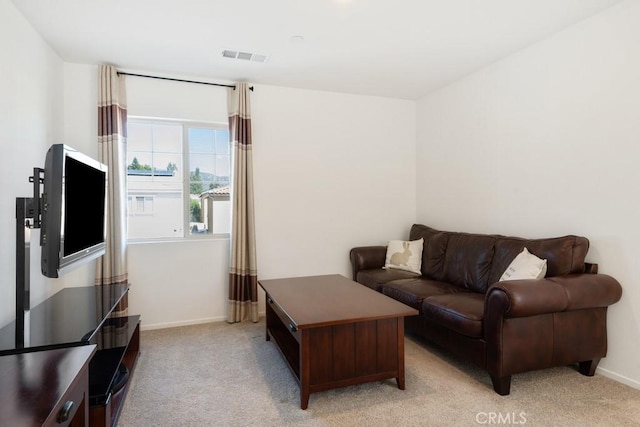 32985 Middlegate Pl, Lake Elsinore, CA 92530 - living area featuring light carpet and baseboards