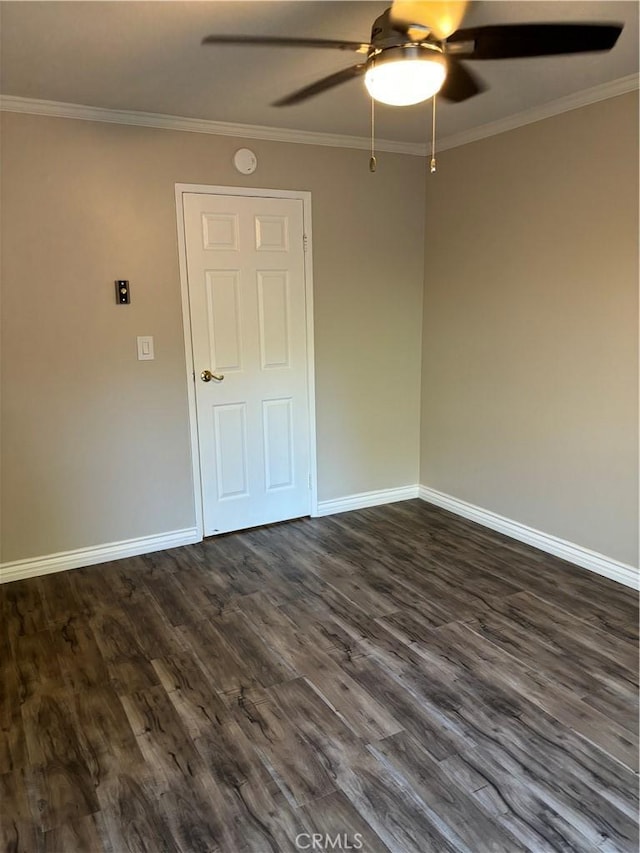 5585 E Pacific Coast Hwy Unit 154, Long Beach, CA 90804 - empty room with a ceiling fan, dark wood-type flooring, crown molding, and a smoke detector