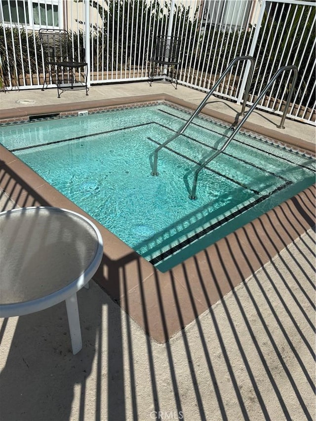 5585 E Pacific Coast Hwy Unit 154, Long Beach, CA 90804 - view of swimming pool with a pool