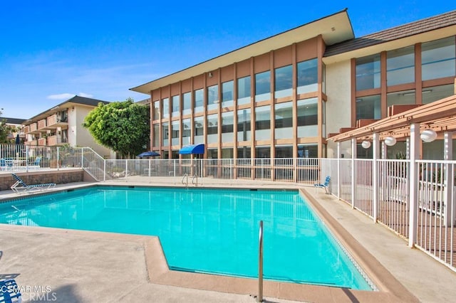 5585 E Pacific Coast Hwy Unit 154, Long Beach, CA 90804 - community pool featuring a patio