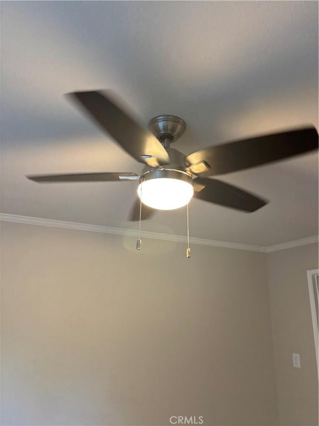 5585 E Pacific Coast Hwy Unit 154, Long Beach, CA 90804 - detailed view of a ceiling fan and ornamental molding