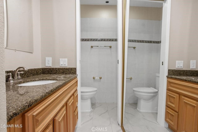 5585 E Pacific Coast Hwy Unit 154, Long Beach, CA 90804 - full bath with marble look tile flooring and vanity