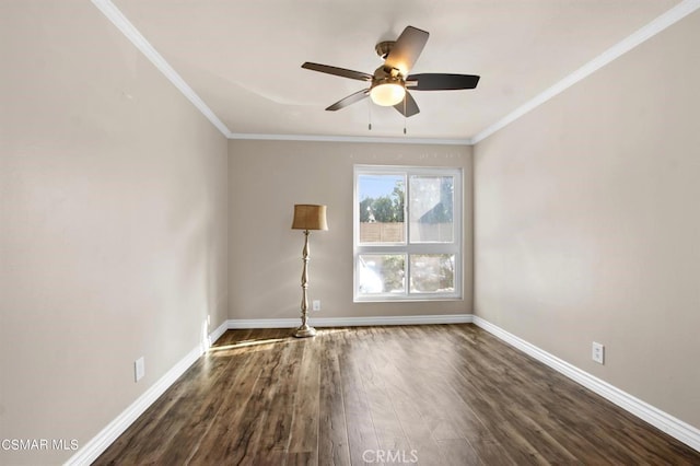 5585 E Pacific Coast Hwy Unit 154, Long Beach, CA 90804 - spare room featuring ornamental molding, a ceiling fan, and dark wood-style flooring