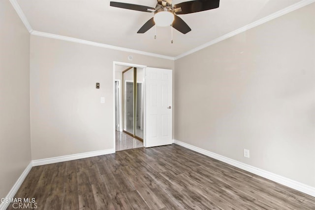 5585 E Pacific Coast Hwy Unit 154, Long Beach, CA 90804 - unfurnished bedroom with wood finished floors, ornamental molding, and a ceiling fan