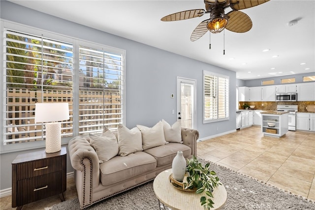 31 Cayman Brac, Aliso Viejo, CA 92656 - living area with a ceiling fan, healthy amount of natural light, light tile patterned floors, and recessed lighting