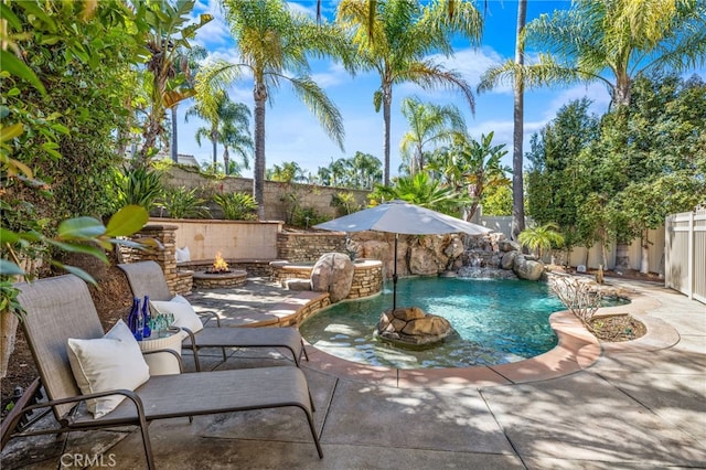 31 Cayman Brac, Aliso Viejo, CA 92656 - view of pool with a fire pit, a fenced backyard, and a patio