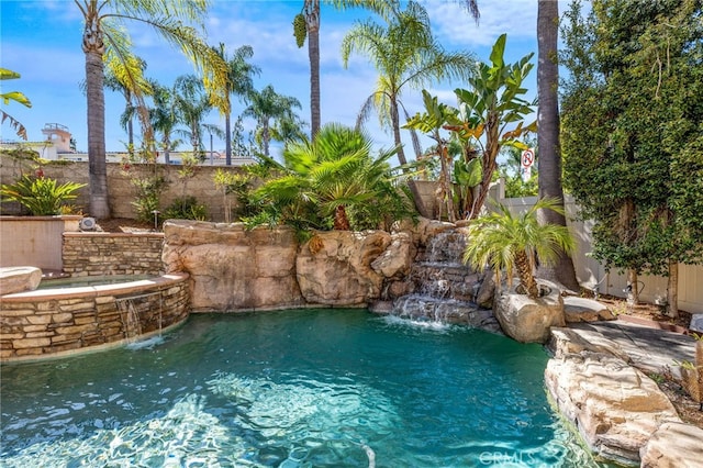 31 Cayman Brac, Aliso Viejo, CA 92656 - view of pool with a fenced backyard and a pool with connected hot tub