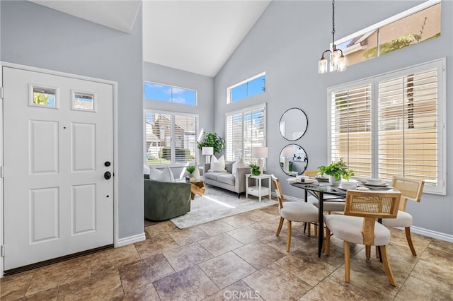 31 Cayman Brac, Aliso Viejo, CA 92656 - dining space featuring high vaulted ceiling and a chandelier