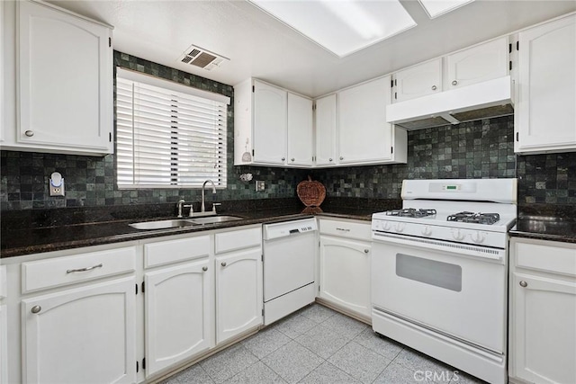 14325 Foothill Blvd Unit 34, Sylmar, CA 91342 - kitchen featuring white appliances, under cabinet range hood, backsplash, and white cabinetry